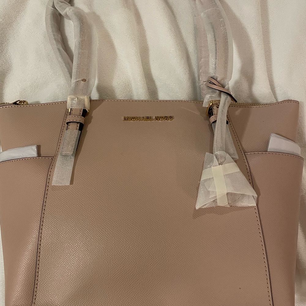 Jet Set East West Logo Charm Saffiano Leather Tote Bag